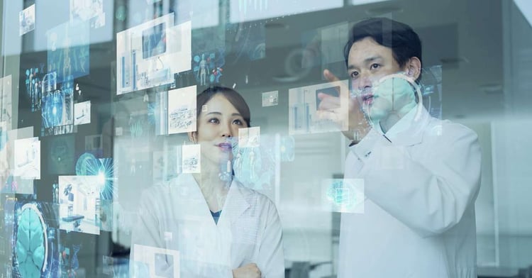 Image of doctors looking at an AI generated screen for patient education