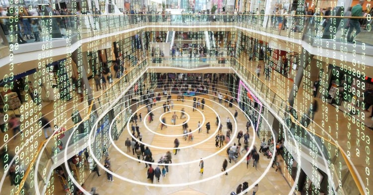 Image of a crowded mall with transparent digital cloud coding represimg cloud migration hovering above everyone.